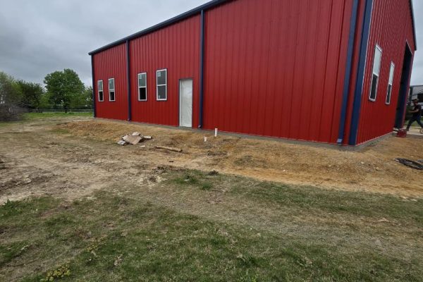 Red steel barn builders