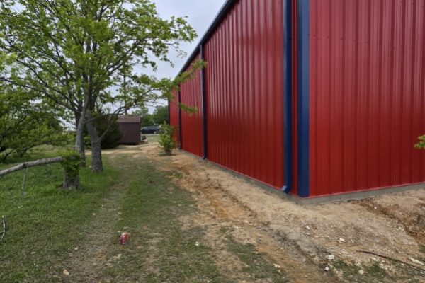 Red steel barn builders